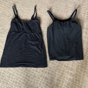 Two black nursing tanks
